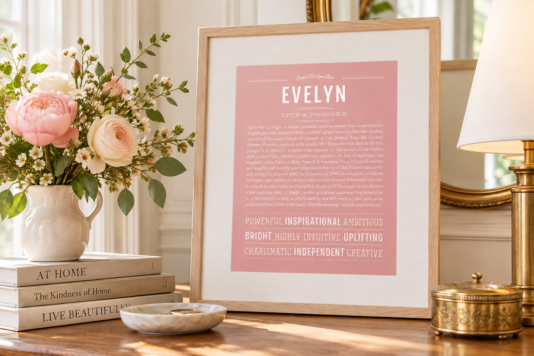 Pink Evelyn Name Stories® art print in a maple frame, styled in a bright, elegant room with flowers and vintage-inspired decor.