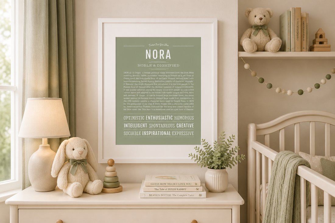 Framed Name Stories® Nora name meaning print displayed in a soft sage-green nursery with a crib, plush bunny, children's books, and neutral décor. Personalized name art featuring the origin, meaning, and history of the name Nora.