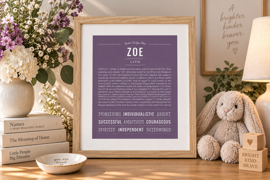 Framed purple Zoe Name Stories® art print featuring the meaning “Life,” styled in a warm, feminine room with flowers, books and soft lavender accents.