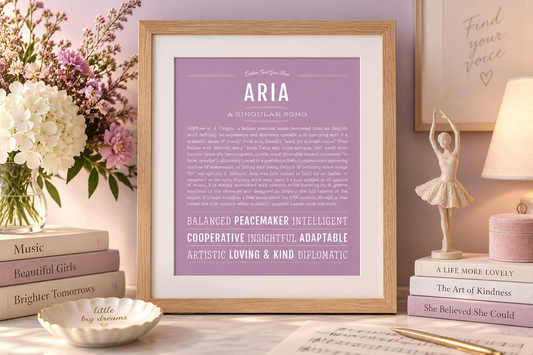 Framed lavender Aria Name Stories® art print featuring the meaning “A Singular Song,” styled in a warm feminine room with flowers, music-inspired details and soft lavender accents.