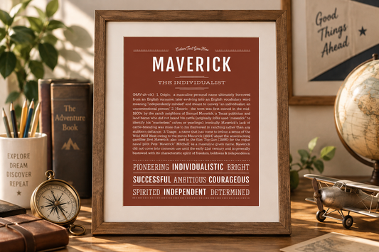 Framed rust-colored Maverick Name Stories® art print displayed on an adventure-inspired desk with a compass, vintage airplane, globe and books.
