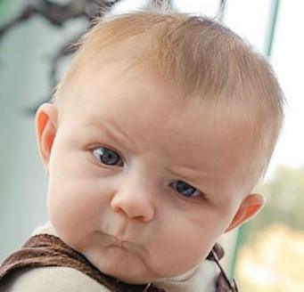 Funny Photo of a Baby with expression that looks "troubled"