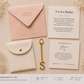 A personalized keepsake gift set laid out on a light beige background with delicate dried flowers. The set includes a pale pink envelope with gold foil text, a cream card with printed text, a white envelope-style pouch with a gold snap and center pin, a gold chain with an initial 'S' keychain, and a printed Shelley keepsake card.